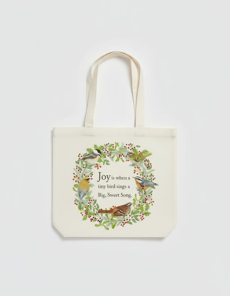 Tote bag with bird design and text on a white background