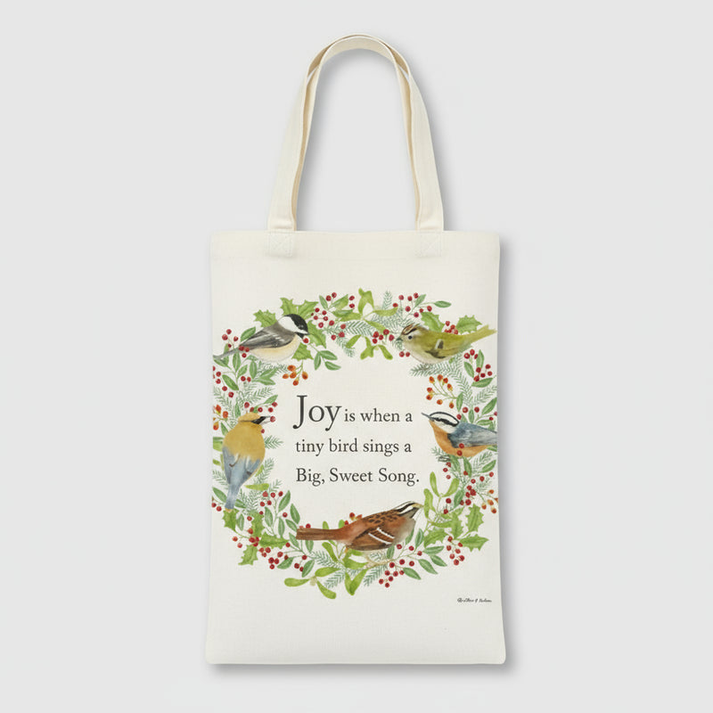 Tote bag with bird design and text on a white background