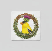 Napkin illustration of a yellow bird with a thistle in a wreath; beverage size