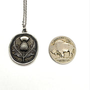 Silver pendant necklace with a buffalo nickel for comparison