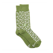 green sock with white branch/ leaf style design