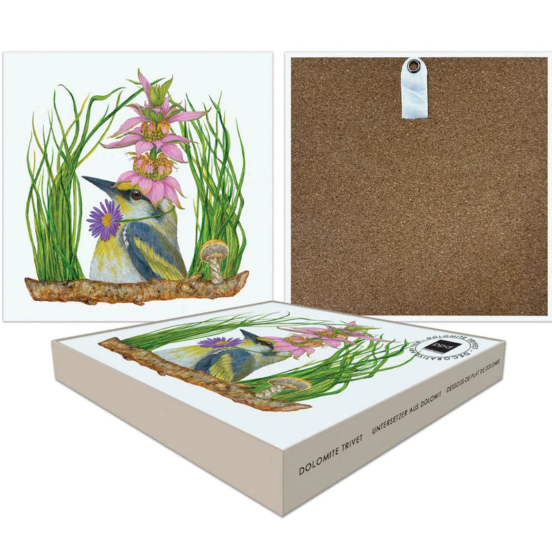 Decorative trivet with a bird and flower design, cork backing and also shown in packaging.