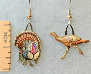 Wild turkey earrings with ruler for scale