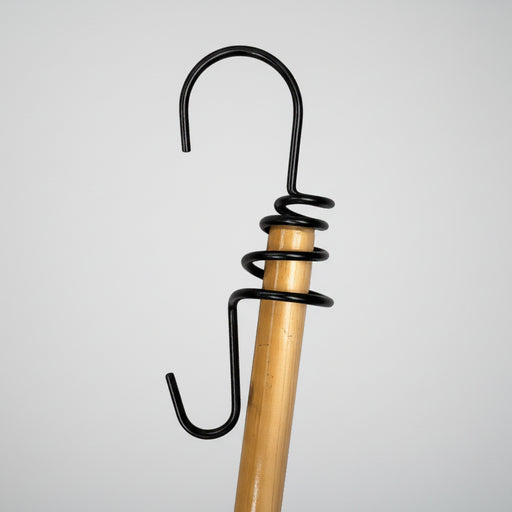 Uplifter Broom Handle Hook on a wooden broom handle