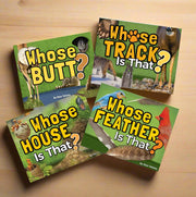 Four children's books on a wooden background