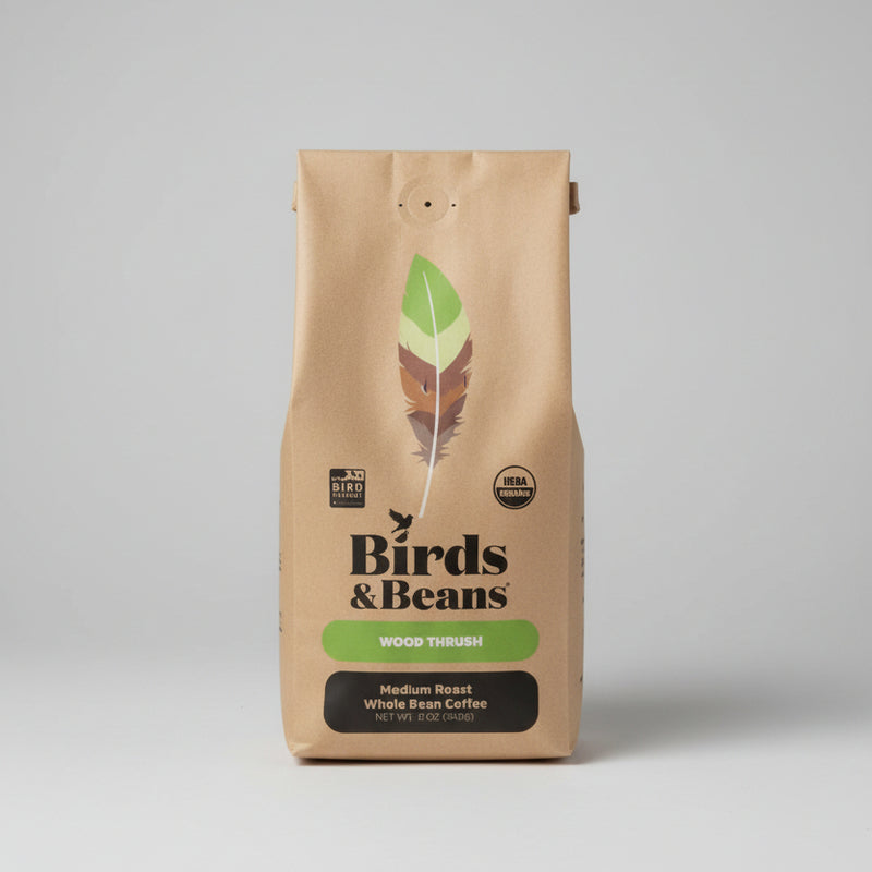 Wood Thrush Medium Roast Whole Bean Coffee in 12 oz bag with white background