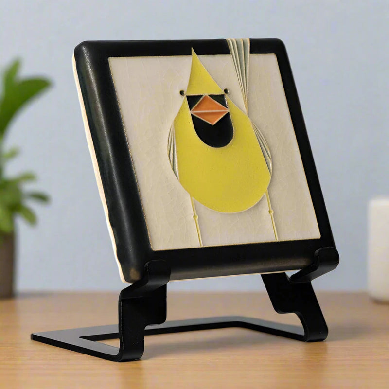 yellow cardinal tile on an easel against a white background. (easel not included)