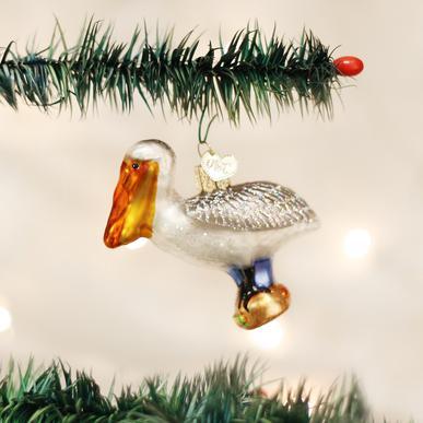 Pelican Ornament On Tree