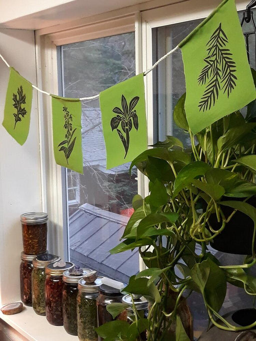 Wild Botanical Prayer Flags hanging over window