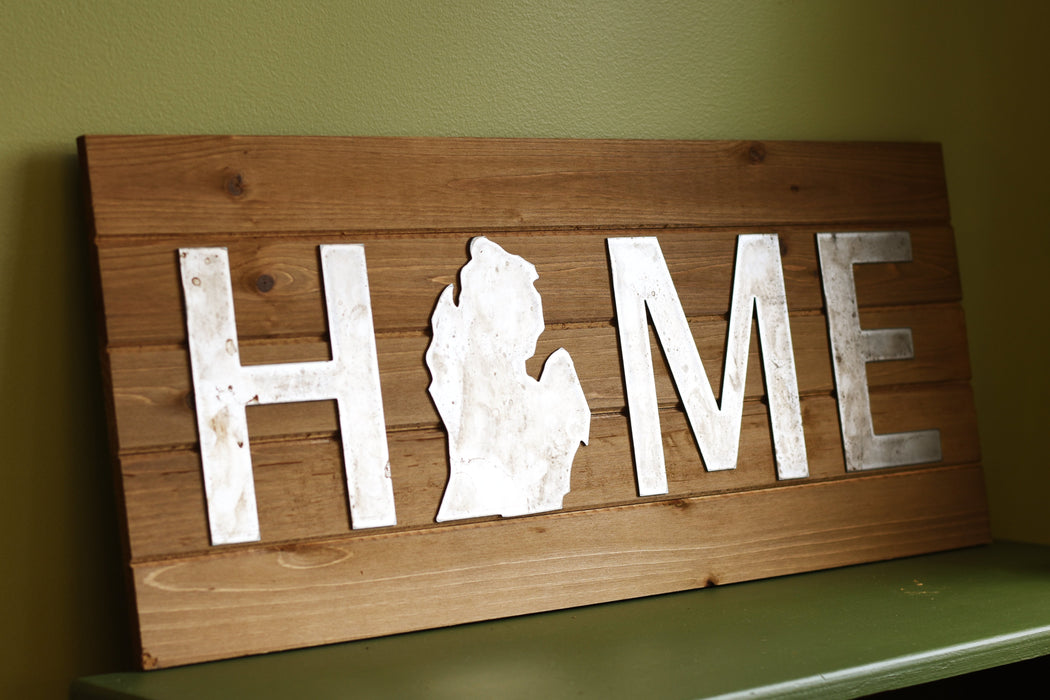 wood and metal Michigan home sign
