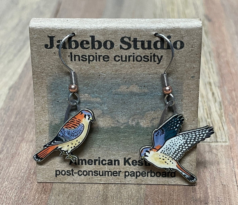 American Kestrel Earrings on cardboard