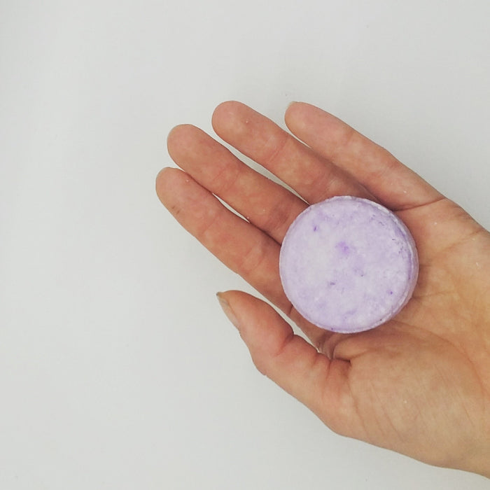 lavender shampoo bar hand scale