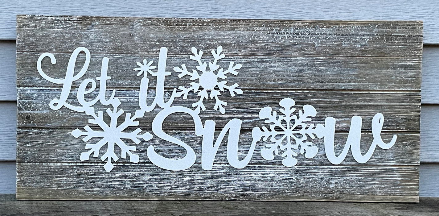 Let It Snow Sign with gray siding background