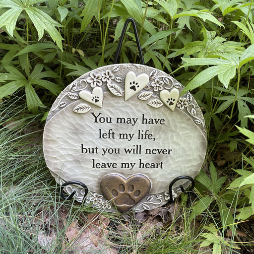 Serene Garden Stone in Pet Heart Pattern shown in flower bed with Garden Stone Easel