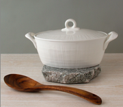 perfect place granite trivet with baking dish and spoon