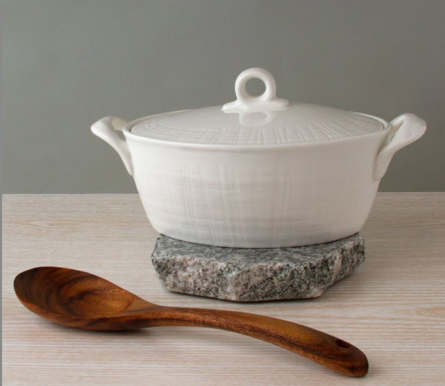 perfect place granite trivet with baking dish and spoon