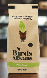 Wood Thrush Medium Roast Ground Coffee in 12 oz bag with white background