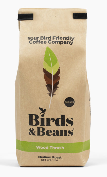 Wood Thrush Medium Roast Ground Coffee in 12 oz bag with white background
