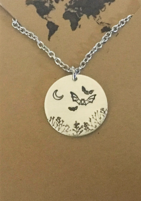 Bats with tree - circular pendant in silver color