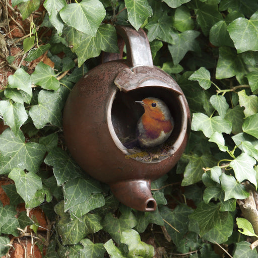 Brown robin teapot nester
