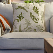 Pillow with ferns printed on it