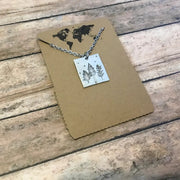 Forest at Night Rectangular Pendant in Silver Color with packaging