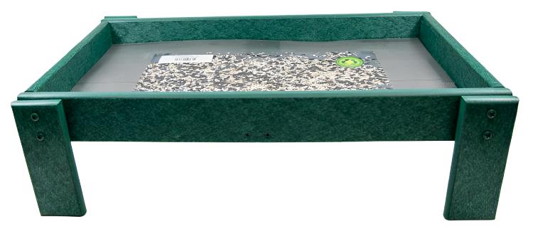 green ground bird feeder