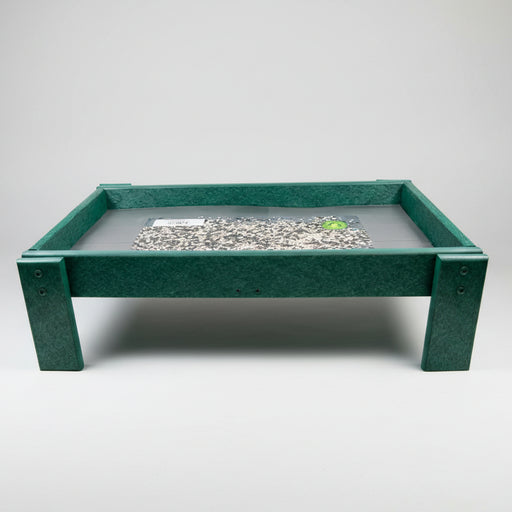 green ground bird feeder