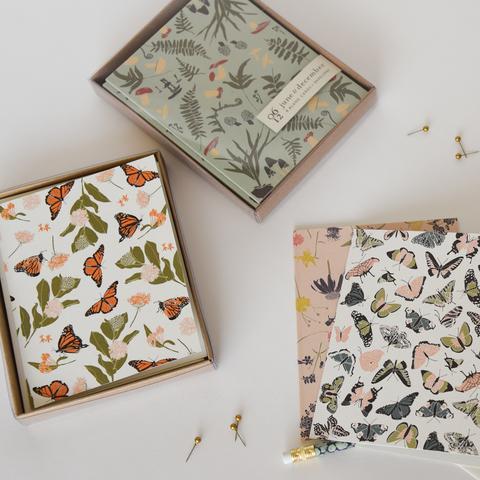 assorted boxed notecards, including forest finds