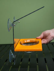 Orange window mount oriole bird feeder