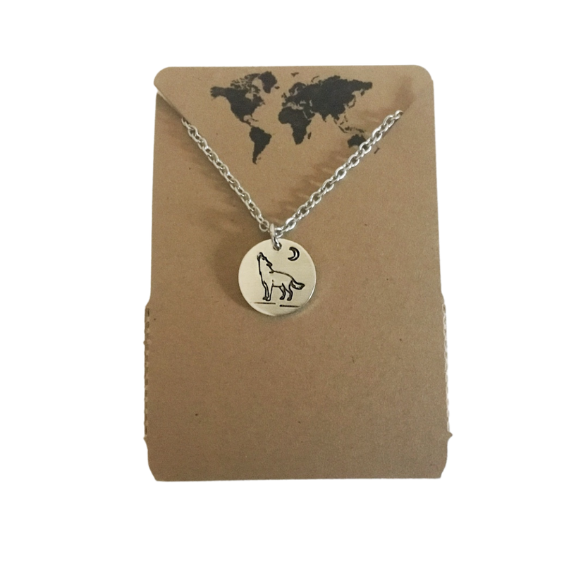 Wolf howling at crescent moon small circular charm neckace